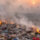 Burning household waste causing air pollution.