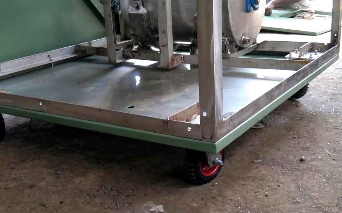 Stainless steel composter base frame with SS sheet floor on castor wheels, under fabrication at the TGMC workshop